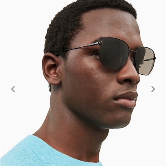 Calvin Klein unisex black matte rectangular sunglasses. main image 6
